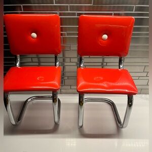 Two American girl red chairs.  Created for Molly in 2000 and retired in 2013.